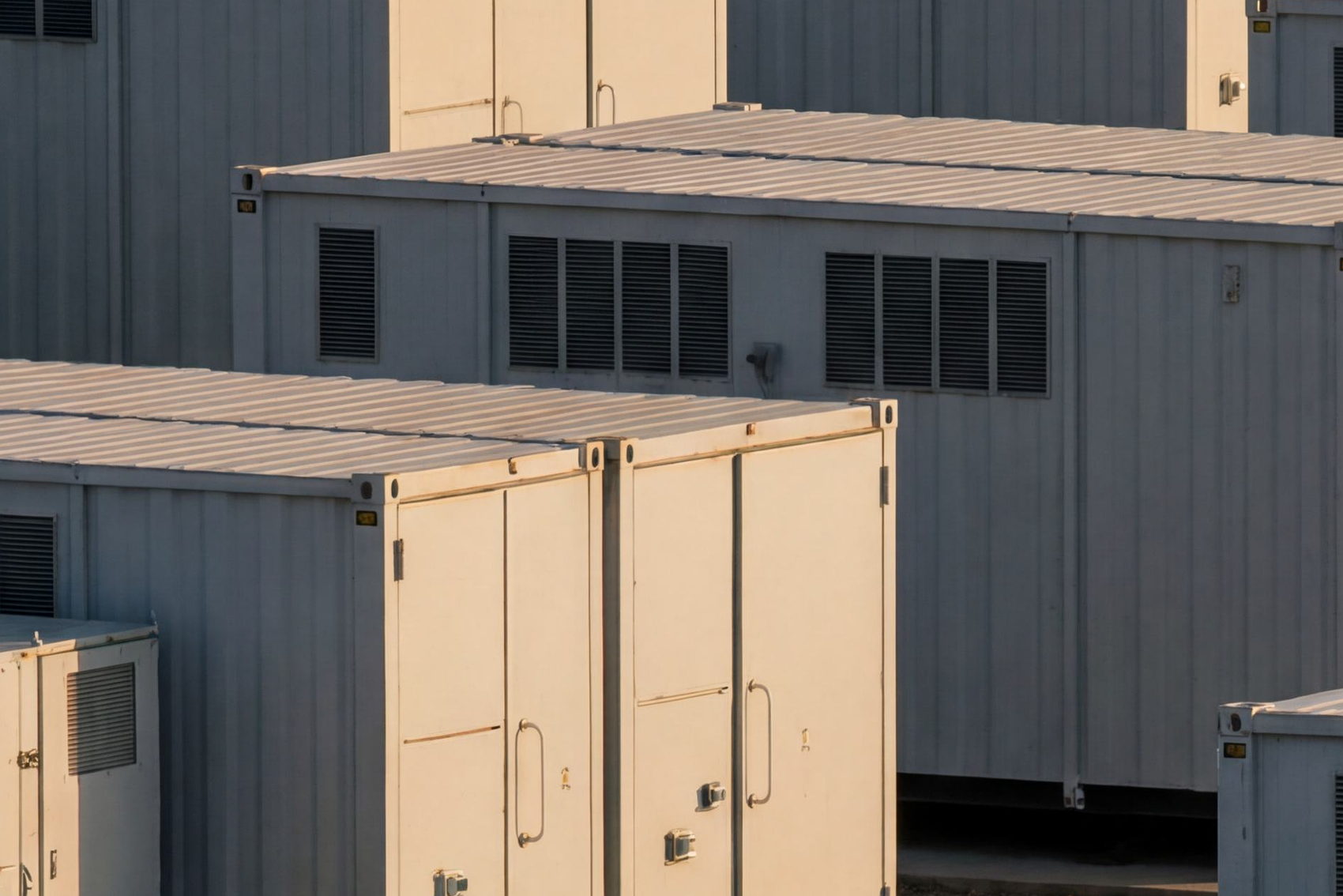 Close view of battery storage enclosures and ventilation louvres